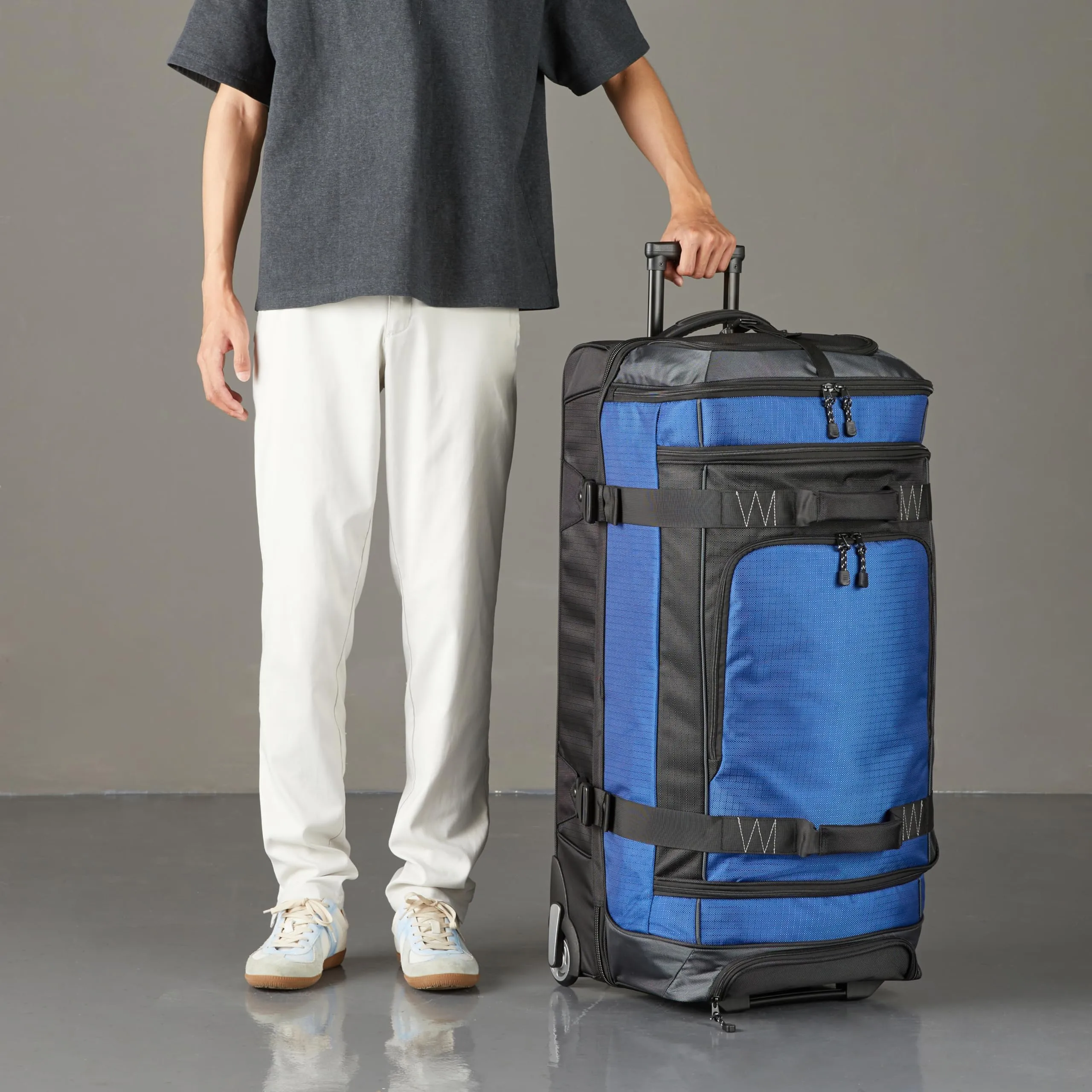 Amazon Basics Rolling Duffel Bag with Wheels, Ripstop Luggage for Traveling, Telescoping Handle, 35", Blue Blue 35" U1